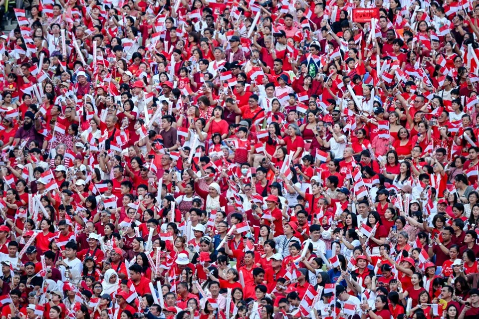 Spectators at the 60th National Day Parade in Singapore, on 9 August 2025. (Caroline Chia/Reuters)