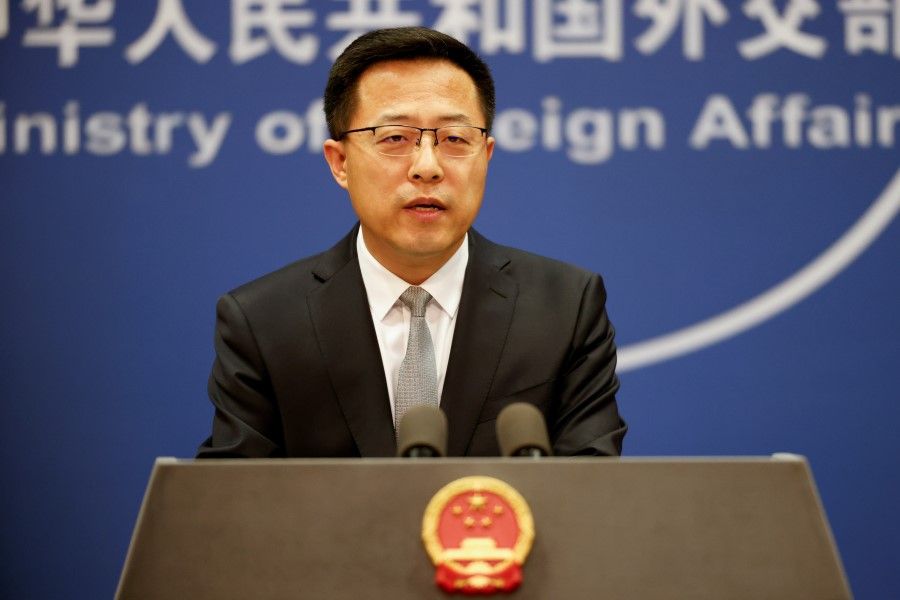 China's foreign ministry spokesperson Zhao Lijian attends a news conference in Beijing, China, 16 November 2021. (Carlos Garcia Rawlins/Reuters)