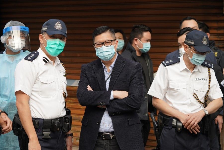 Hong Kong Police Commissioner Chris Tang (centre) with police officers on duty in Jordan, Hong Kong, 23 January 2021. (CNS)
