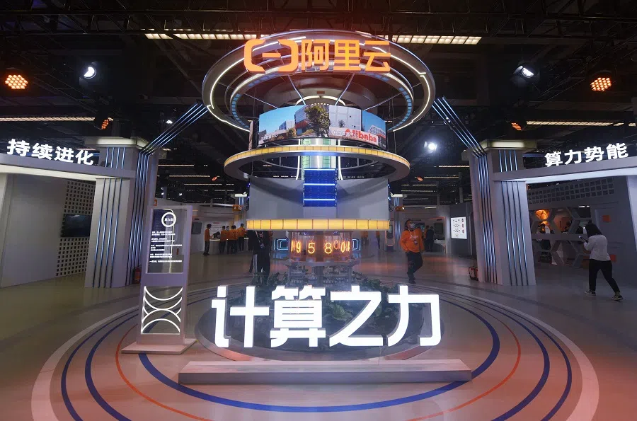 People visit the Apsara Conference, a cloud computing and artificial intelligence (AI) conference, in Hangzhou, Zhejiang province, China, on 3 November 2022. (AFP)