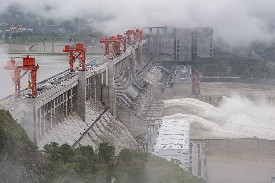 This picture taken on 29 June 2020 shows water being released from the Three Gorges Dam, a gigantic hydropower project on the Yangtze river, in Yichang, China. (STR/AFP)