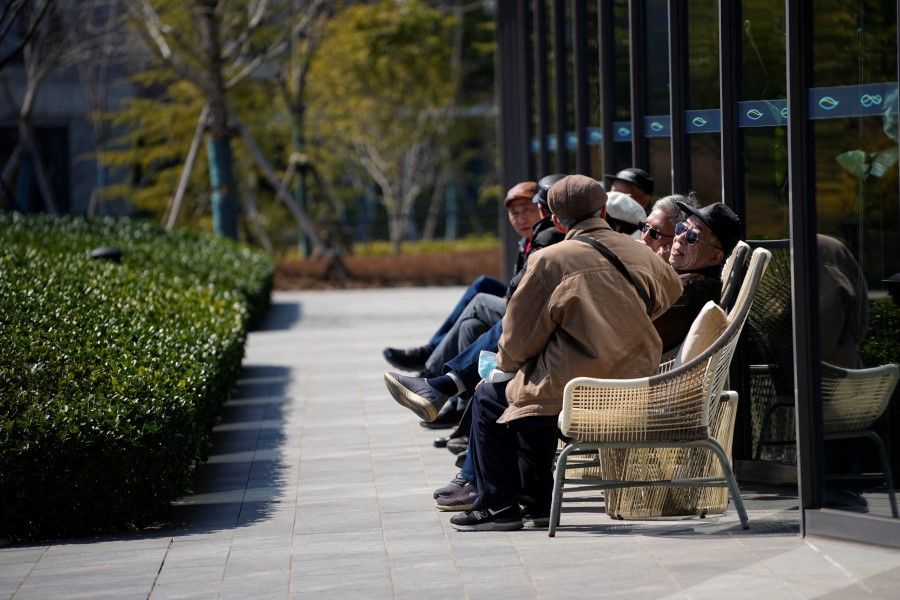 Elderly visitors enjoy the sunshine, at a nursing home of Lendlease's Ardor Gardens in Shanghai, China, 27 February 2023. (Aly Song/Reuters)