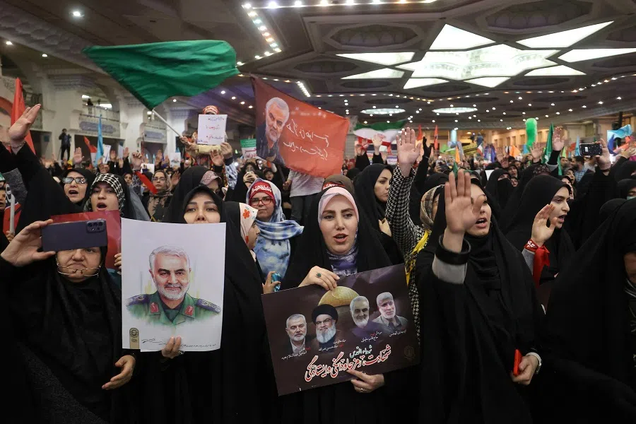 Iranian women hold pictures of Qassem Soleimani during a ceremony to mark the fifth anniversary of the killing of senior Iranian military commander General Qassem Soleimani in a US attack, in Tehran, Iran, on 2 January 2025. (Majid Asgaripour/WANA (West Asia News Agency) via Reuters)