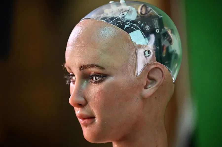 This photo taken on 10 May 2023 shows the latest version of a robot called Sophia being tested at Hanson Robotics, a robotics and artificial intelligence company which creates human-like robots, in Hong Kong, China. (Peter Parks/AFP)
