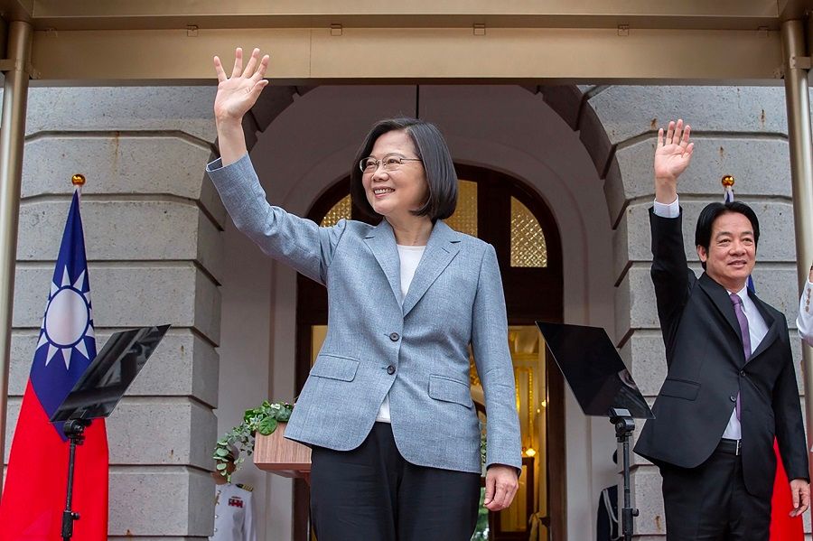 This handout picture taken and released on 20 May 2020 by the Taiwan Presidential office shows Taiwan's President Tsai Ing-wen (centre) and Vice President William Lai waving during an inauguration event for their respective terms in office, at the Taipei Guest House in Taipei. (Handout/Taiwan Presidential Office/AFP)