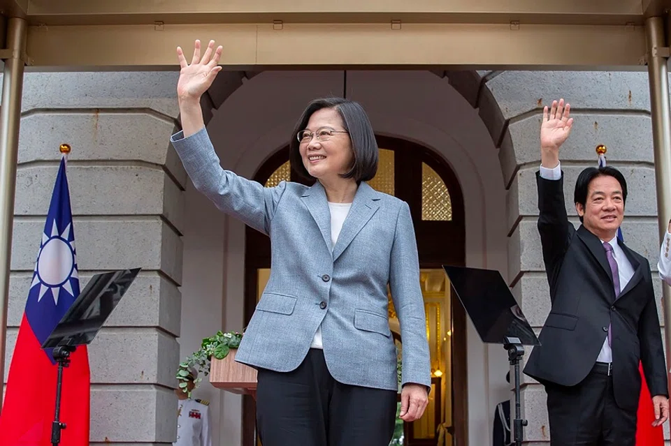 This handout picture taken and released on 20 May 2020 by the Taiwan Presidential office shows Taiwan's President Tsai Ing-wen (centre) and Vice President William Lai waving during an inauguration event for their respective terms in office, at the Taipei Guest House in Taipei. (Handout/Taiwan Presidential Office/AFP)