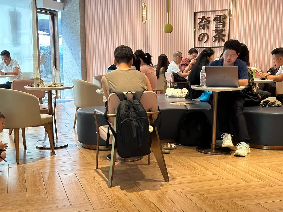 A shot of a cafe in Shenzhen, where unemployed netizens also visit to “pretend to work”. (Daryl Lim/SPH Media)