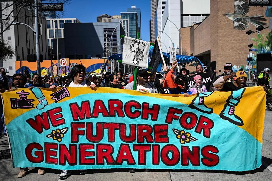 Demonstrators protest against the CERAweek by S&P Global energy conference, near the hotel where the conference is being attended, in Houston, Texas, US, on 10 March 2025.