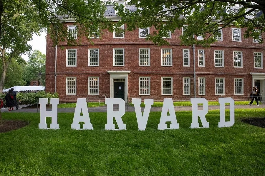 A Harvard sign is seen at the Harvard University campus in Boston, Massachusetts, on 27 May 2025.