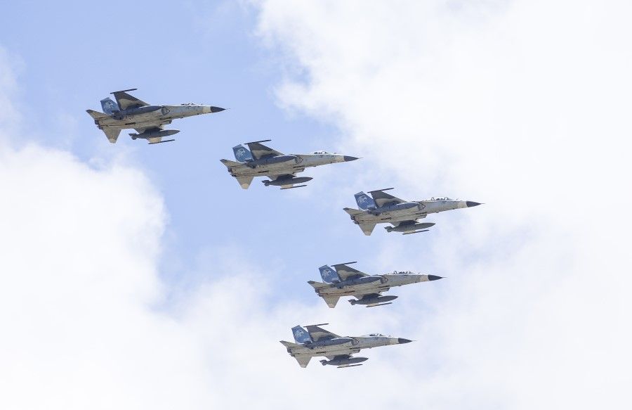 Indigenous Defense Fighter (IDF) jets, manufactured by Aerospace Industrial Development Corp., fly over the city during the Double Tenth Day celebration in Taipei, Taiwan, on 10 October 2021. (I-Hwa Cheng/Bloomberg)