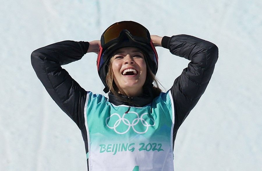 Eileen of China celebrates on the podium at the medal ceremony following the Women's Freeski Big Air event at the 2022 Beijing Winter Olympics, Big Air Shougang, Beijing, China, 8 February 2022. (Phil Noble/Reuters)