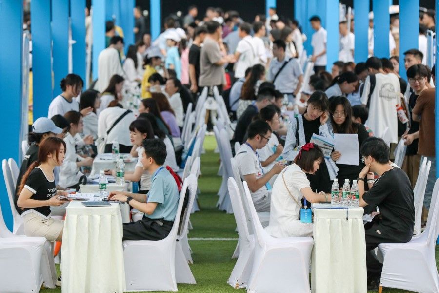 This photo taken on 14 June 2023 shows university graduates and youths attending a job fair in Yibin, in China's southwestern Sichuan province. (CNS/AFP)
