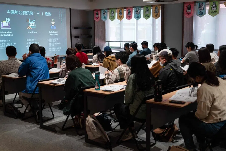 In this picture taken on 16 April 2023, students attend a civil defence course at Kuma Academy in Taipei. (Jack Moore/AFP)