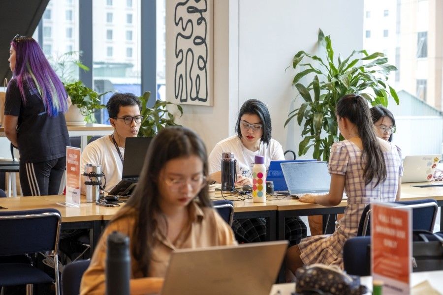 People work at Sentry, a co-working space, in Ho Chi Minh City, Vietnam, on 11 August 2022. Industry insiders say Ho Chi Minh City has the makings of the next Silicon Valley-lite. (Maika Elan/Bloomberg)