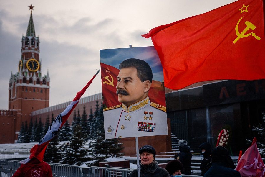 Russian Communist party supporters attend a memorial ceremony to mark the 142nd anniversary of late Soviet leader Joseph Stalin's birth at Red Square in Moscow, Russia, on 21 December 2021. (Dimitar Dilkoff/AFP)