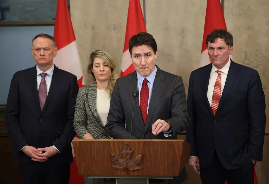 Canada’s Prime Minister Justin Trudeau is joined by Finance Minister Dominic LeBlanc, Minister of Foreign Affairs Melanie Joly, and Minister of Public Safety David McGuinty, as he speaks during a press conference while responding to US President Donald Trump’s orders to impose 25% tariffs on Canadian imports, in Ottawa, Ontario, Canada, on 1 February 2025. (Patrick Doyle/Reuters)