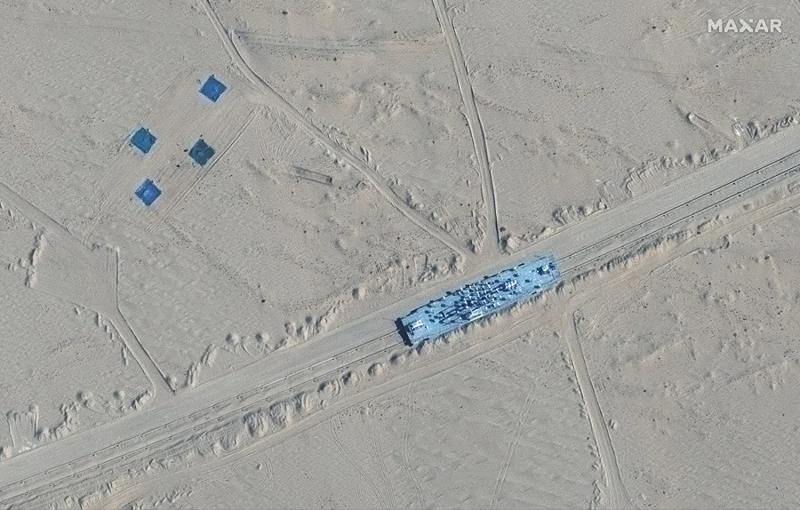 A satellite picture shows a mobile target in Ruoqiang, Xinjiang, China, 20 October 2021. (Satellite Image ©2021 Maxar Technologies/Handout via Reuters)
