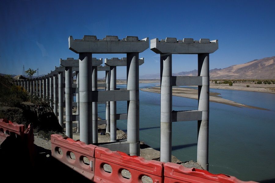 Pillars for a highway bridge are seen during construction in Samzhubze County, Tibet Autonomous Region, China, 17 October 2020. (Thomas Peter/Reuters)