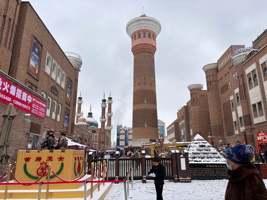 Paramilitary police officers on duty at the entrance to the Xinjiang International Grand Bazaar. (Li Kang/SPH Media)