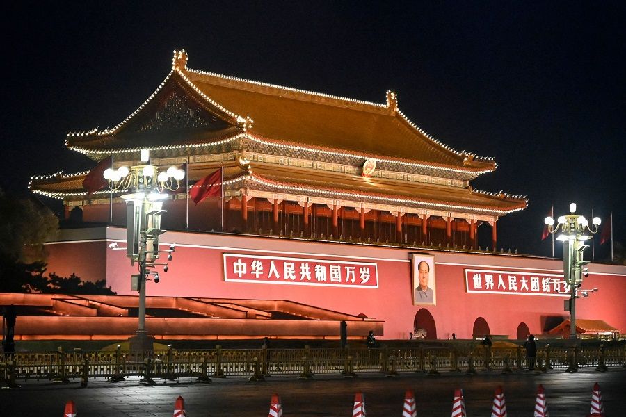 A view of Tiananmen Gate with the portrait of late communist leader Mao Zedong is seen at night in Beijing, China, on 1 December 2022. (Jade Gao/AFP)