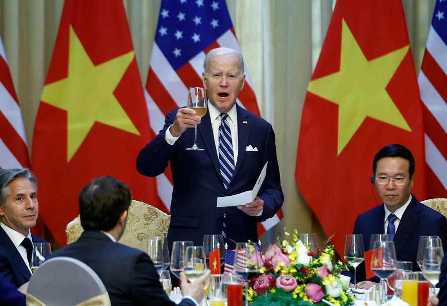 US President Joe Biden raises a toast with Vietnam's President Vo Van Thuong in Hanoi, Vietnam, on 11 September 2023. (Evelyn Hockstein/Reuters)