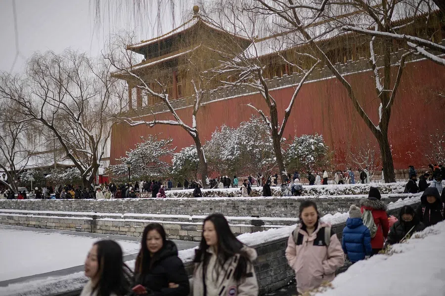 People visit the Forbidden City in Beijing, China, on 21 February 2024.  (Pedro Pardo/AFP)