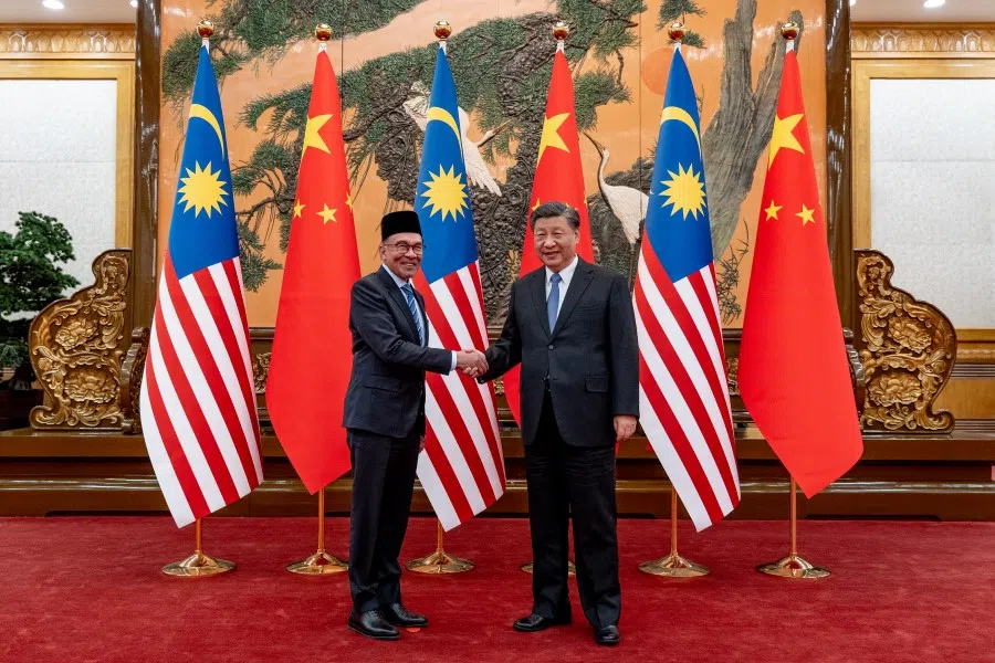 Malaysian Prime Minister Anwar Ibrahim (left) with Chinese President Xi Jinping (right) at the Great Hall of the People, Beijing, China, 31 March 2023. (Sadiq Asyraf/Prime Minister's Office of Malaysia)