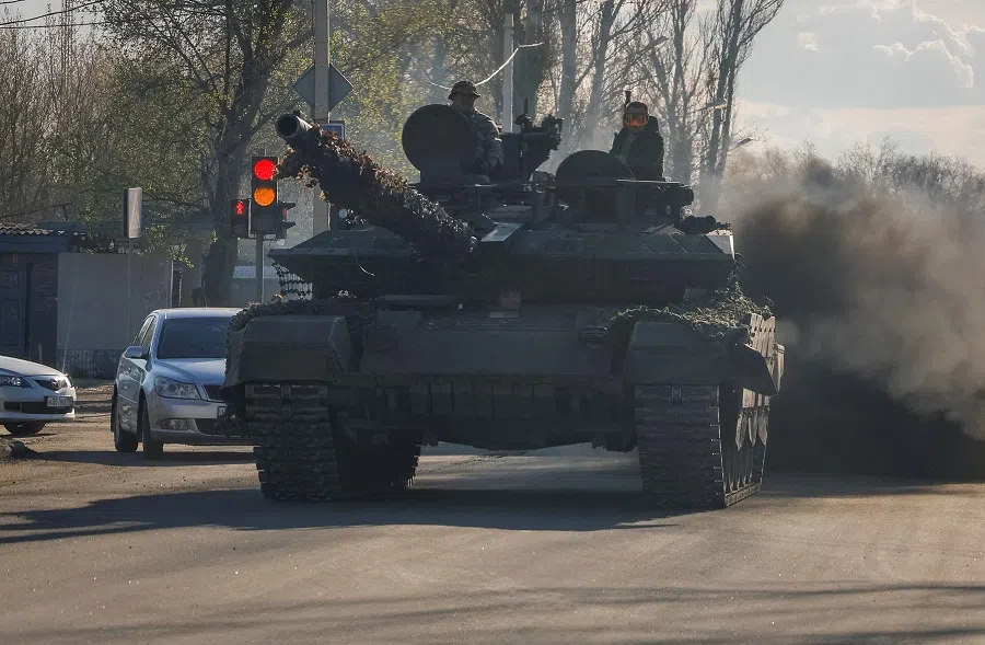 Russian army servicemen drive a tank on a street in Donetsk, Russian-controlled Ukraine on 6 April 2024.