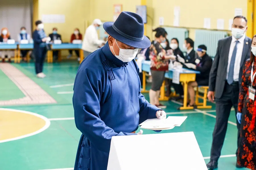 Mongolia's Prime Minister Ukhnaa Khurelsukh wearing a face mask votes at a polling site in Ulaanbaatar, the capital of Mongolia on 24 June 2020. (Byambasuren Byamba-ochir/AFP)