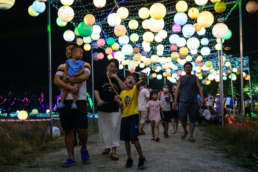 This photo taken on 12 September 2022 shows people visiting a lantern show during the Mid-Autumn Festival in Guangzhou, Guangdong province, China. (AFP)