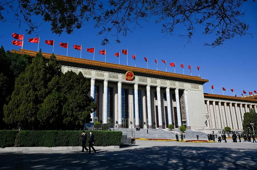 People gather around the Great Hall of the People during the closing ceremony of the 20th Party Congress in Beijing, China, on 22 October 2022. (Wang Zhao/AFP)