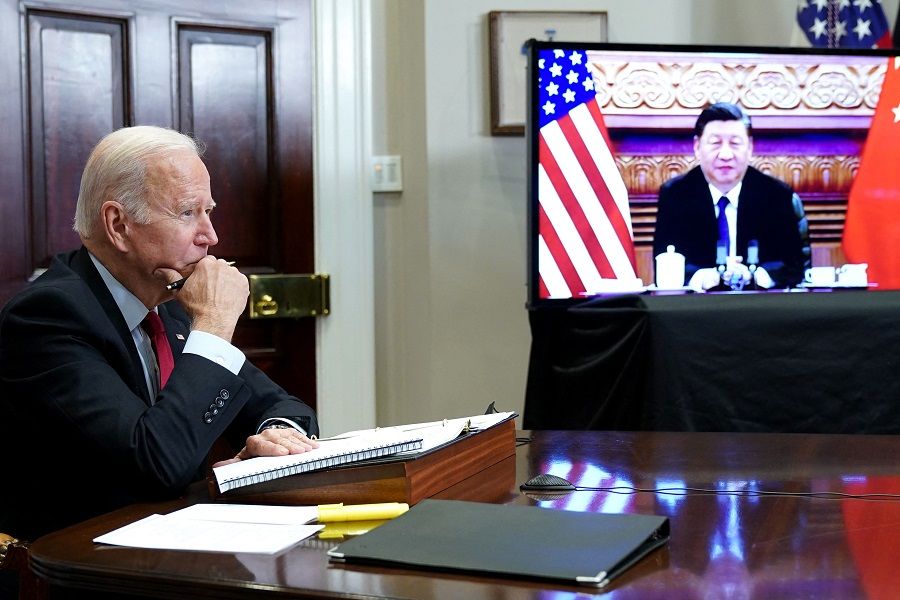 US President Joe Biden meets with Chinese President Xi Jinping during a virtual summit from the Roosevelt Room of the White House in Washington, DC, 15 November 2021. (Mandel Ngan/AFP)