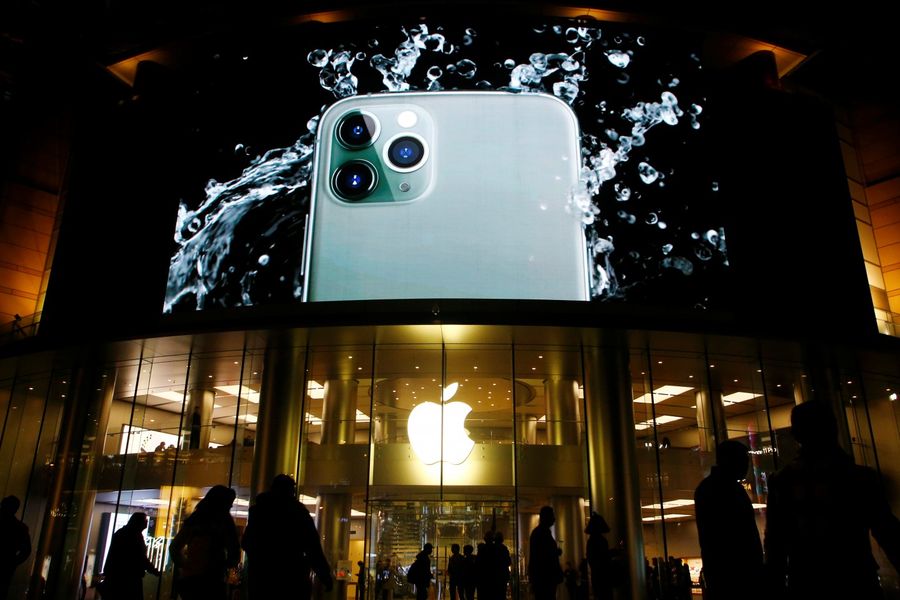 The knowledge economy, symbolised by the Apple iPhone, has caused vastly unequal income distribution and social differentiation within the US. (Florence Lo/Reuters)