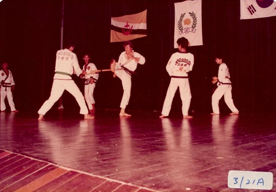 Aside from working his day job, my father (third from right) was also a Tang Soo Do martial arts assistant instructor. This photo was taken during a demonstration in Pusat Belia, Brunei, 6 October 1984.