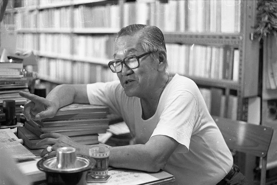 Mr Yeow Li Chi with his treasure trove at his bookshop at Bras Basah Complex. (SPH)