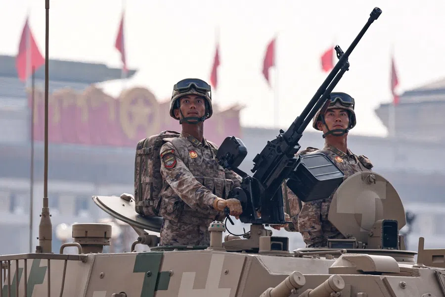 Members of the People’s Liberation Army Ground Assault Force stand on an armoured vehicle in an amphibious assault vehicle formation during a military parade to mark the 80th anniversary of the end of World War Two, in Beijing, China, on 3 September 2025.