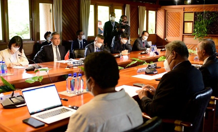 This handout photo taken and released by the Pacific Islands Forum on 29 May 2022 shows Secretary-General of the Pacific Islands Forum Henry Puna (right) holding a meeting with Chinese Foreign Minister Wang Yi (second from left) in Fiji's capital city of Suva. (Handout/Pacific Islands Forum/AFP)