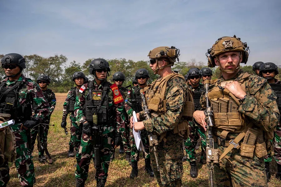 Indonesian and US marines coordinate during patrol practice as part of the Super Garuda Shield joint military exercise at the Bhumi Marinir Karangpilang in Surabaya on 27 August 2024. (Juni Kriswanto/AFP)