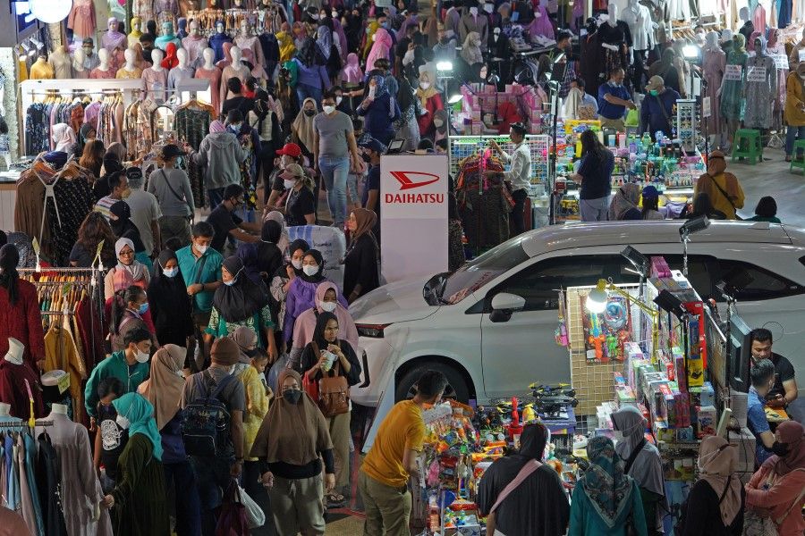 Shoppers in Tanah Abang market in Jakarta, Indonesia, on 26 February 2022. (Dimas Ardian/Bloomberg)