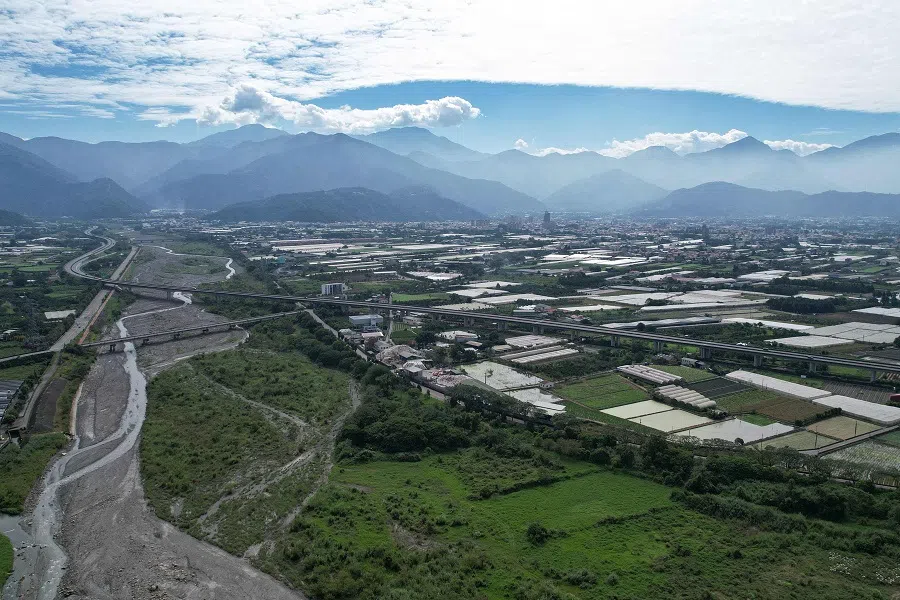 This aerial picture taken on 19 October 2019 shows Puli Township in the foothills of Taiwan's central mountain range. (AFP)