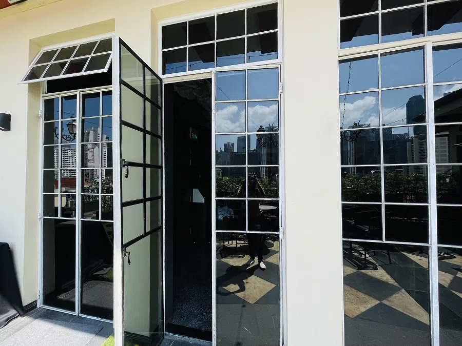 The balcony windows on the top floor are original. (Photo: Grace Chong)