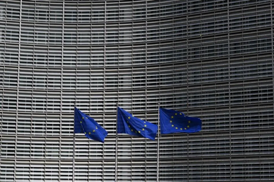 European Union flags outside the EU Commission headquarters in Brussels on 16 March 2026. (Nicolas Tucat/AFP)