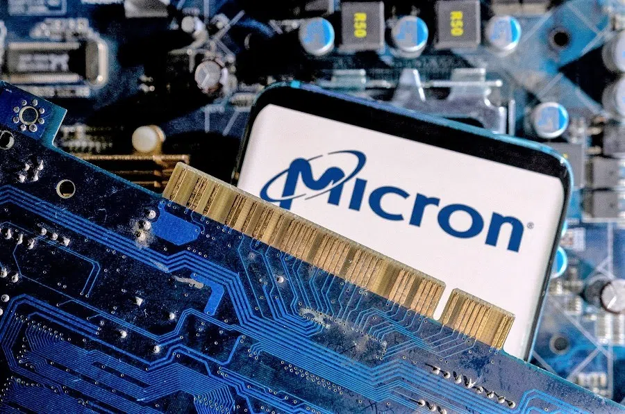 A smartphone with a displayed Micron logo is placed on a computer motherboard in this illustration taken on 6 March 2023. (Dado Ruvic/Illustration/File Photo/Reuters)