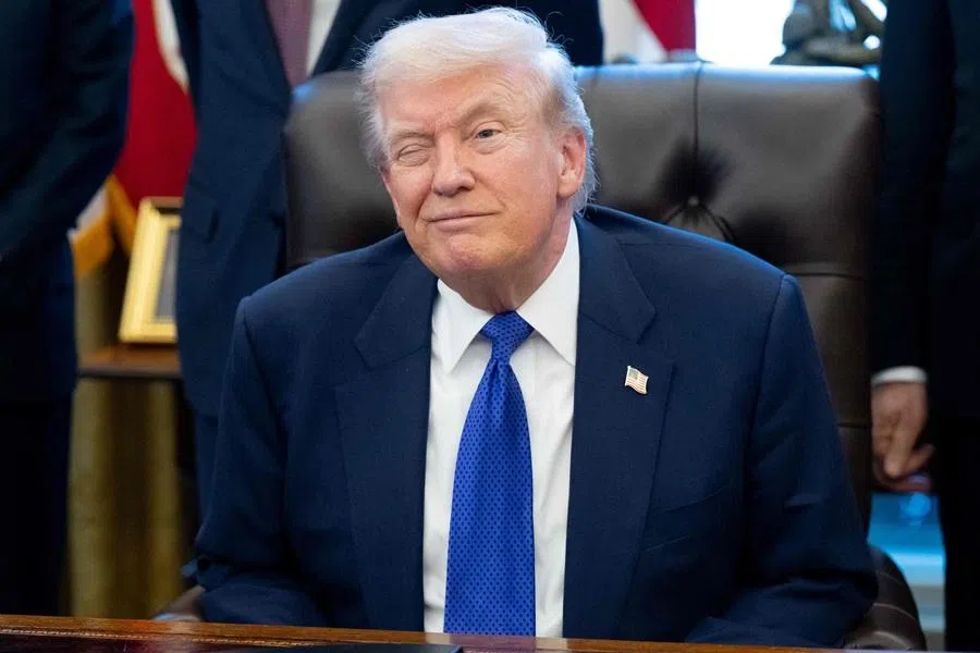 US President Donald Trump winks as he speaks to the press in the Oval Office of the White House in Washington, DC, on 2 February 2026.