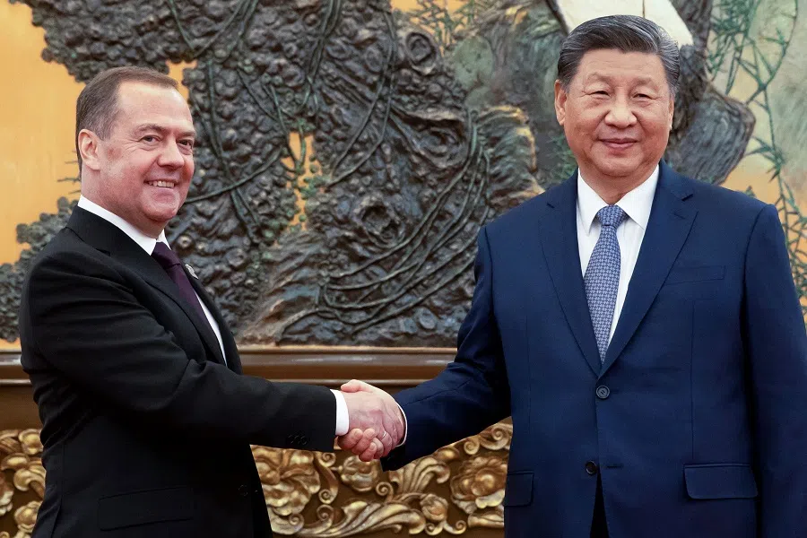 In this photograph taken by Russian state agency Sputnik, Deputy Chairman of the Russian Security Council, former Russian president Dmitry Medvedev meets China’s President Xi Jinping in Beijing on 12 December 2024. (Ekaterina Shtukina/Pool via Reuters)