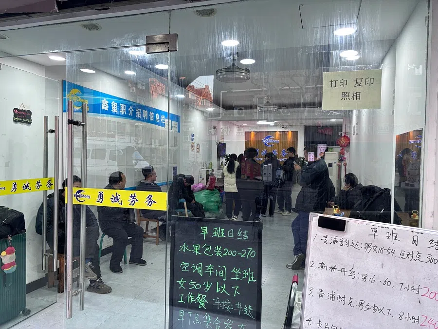 A labour agency in Shanghai is full of job seekers even before 6 am. (Li Kang/SPH Media)