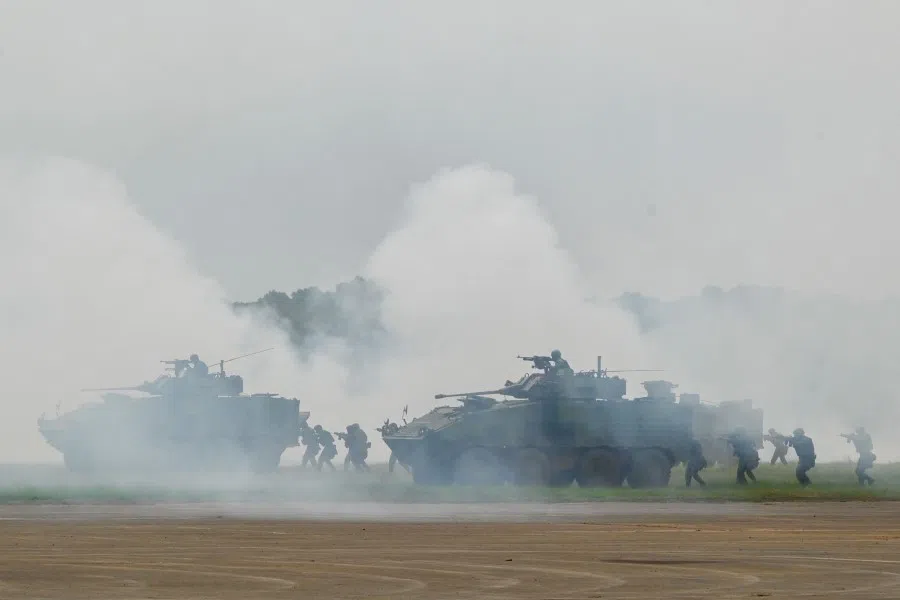 Taiwanese soldiers demonstrate their combat skills during a military open house event in Hsinchu on 21 September 2023. (Sam Yeh/AFP)