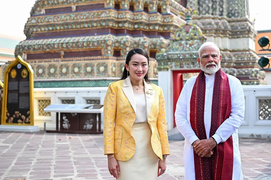 India’s Prime Minister Narendra Modi (right) and Thailand’s Prime Minister Paetongtarn Shinawatra pose for photos at the Wat Pho Buddhist temple complex in Bangkok on 4 April 2025, during his visit to Thailand for the 6th Bengal Initiative for Multi-Sectoral Technical and Economic Cooperation (BIMSTEC) summit.