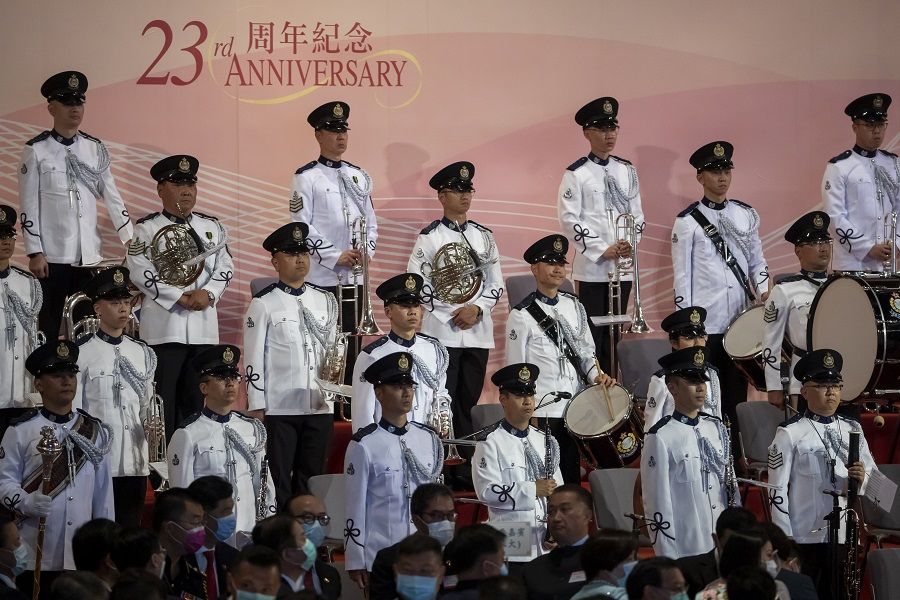Members of a brass band prepare to perform at a ceremony to mark the 23rd anniversary of Hong Kong's return to Chinese rule in Hong Kong on 1 July 2020. (Paul Yeung/Bloomberg)