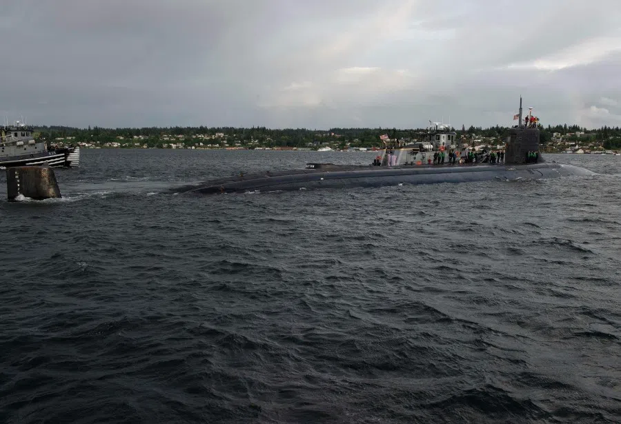 In this image released by the US Navy, The Seawolf-class fast-attack submarine USS Connecticut (SSN 22) departs Naval Base Kitsap-Bremerton for deployment in Bremerton, Washington on 27 May 2021. (US Navy/AFP)